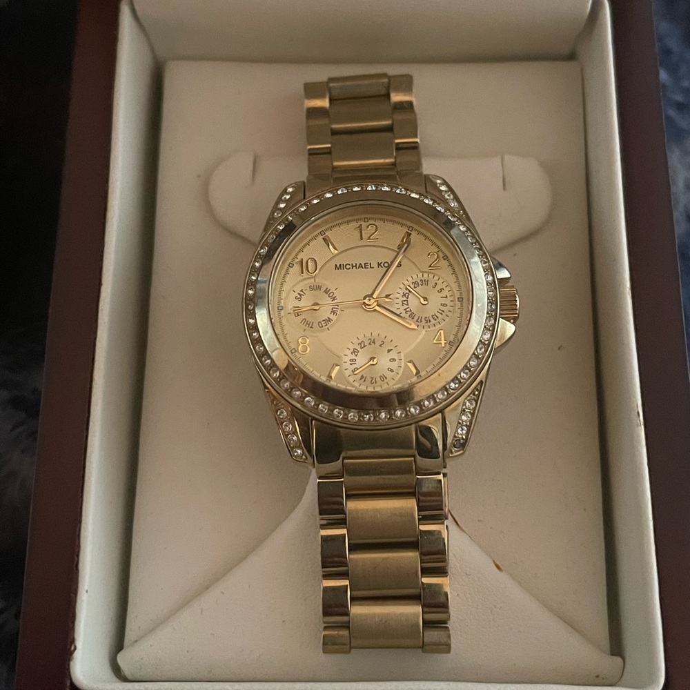 Womens Michael Kors gold diamond face watch